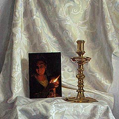 Still life with postcard and candlestick